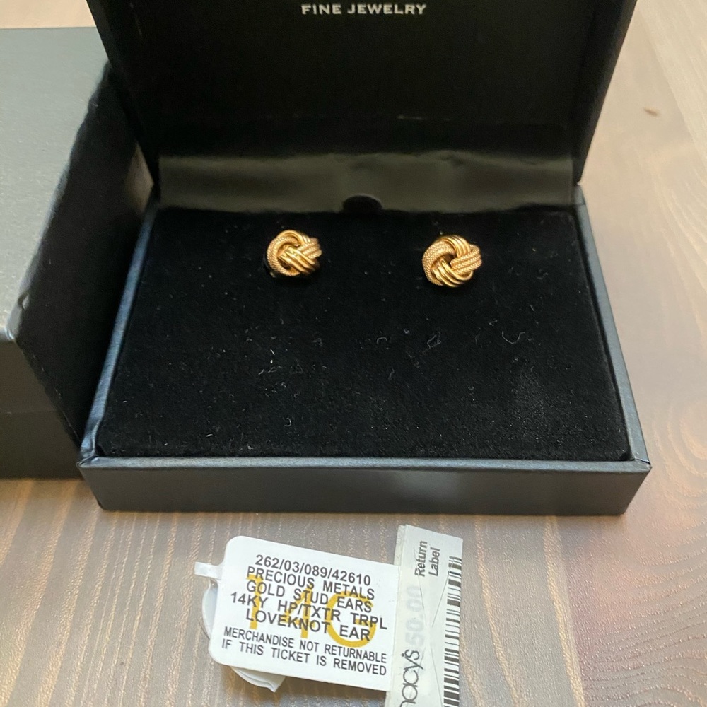 Gold stud earrings
